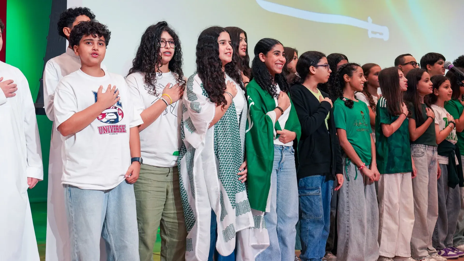 AISJ students representing the school community during an International Day stage moment